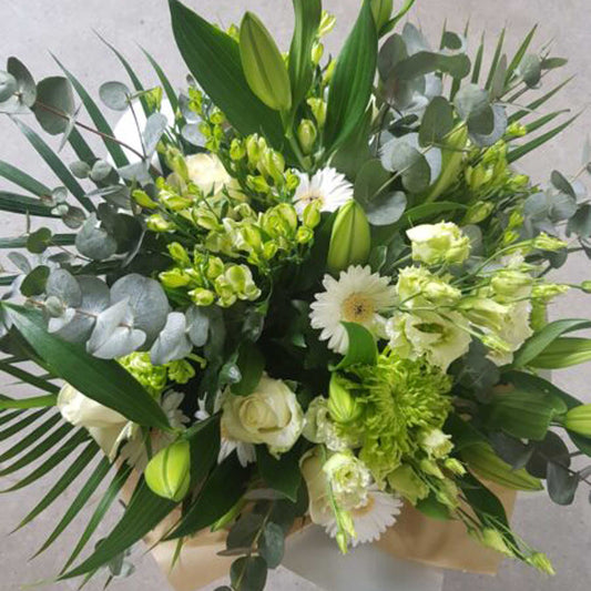 The Florist Choice - White & Green by ReCreation Flowers features white roses, lilies, gerberas, seasonal blooms, and greenery—expertly arranged by your Leigh on Sea florist with same-day delivery for any occasion.