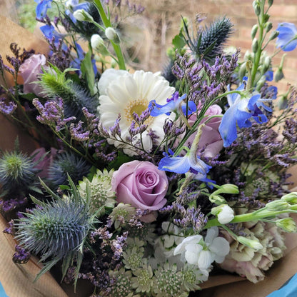 Florist Choice – Pastel by ReCreation Flowers features a hand-tied mix of seasonal pastel blooms, beautifully arranged and wrapped in rustic brown paper by your Leigh on Sea florist.